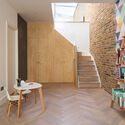 18 Interior Projects that Use Open Storage to Hide Clutter in Plain Sight - Image 12 of 19
